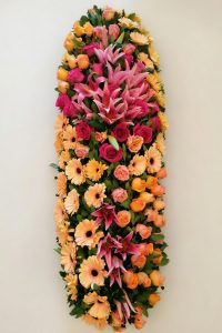 Alt= copricassa colorato con roselline,gerbere e liliumm- Emozioni floreali di Giusy Surace, Villa San Giovanni